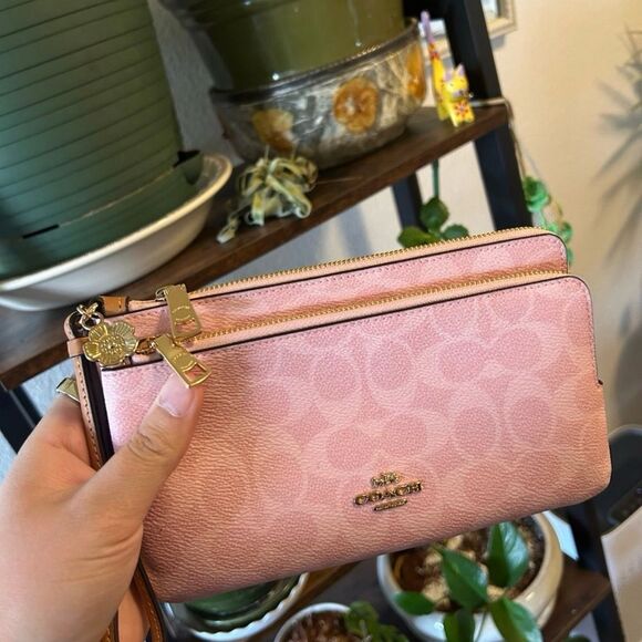 Coach Handbags - Coach Powder Pink Double Zip Wristlet In Signature Canvas With Charms